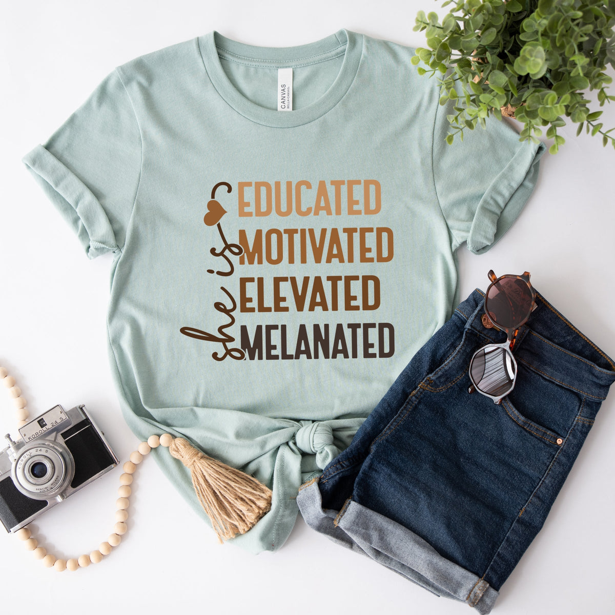 She Is Melanated - Women's Short Sleeve Graphic T-Shirt