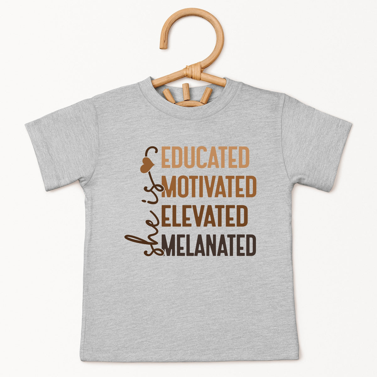 She Is Melanated - Toddler Short Sleeve Graphic T-Shirt
