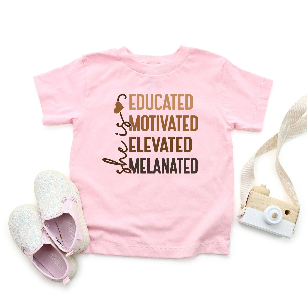 She Is Melanated - Toddler Short Sleeve Graphic T-Shirt