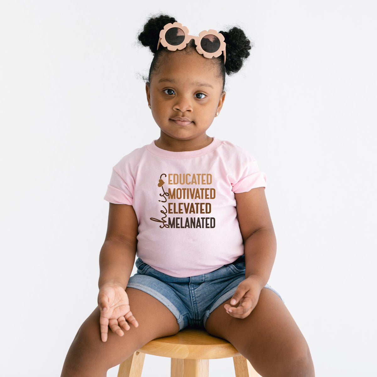 She Is Melanated - Toddler Short Sleeve Graphic T-Shirt