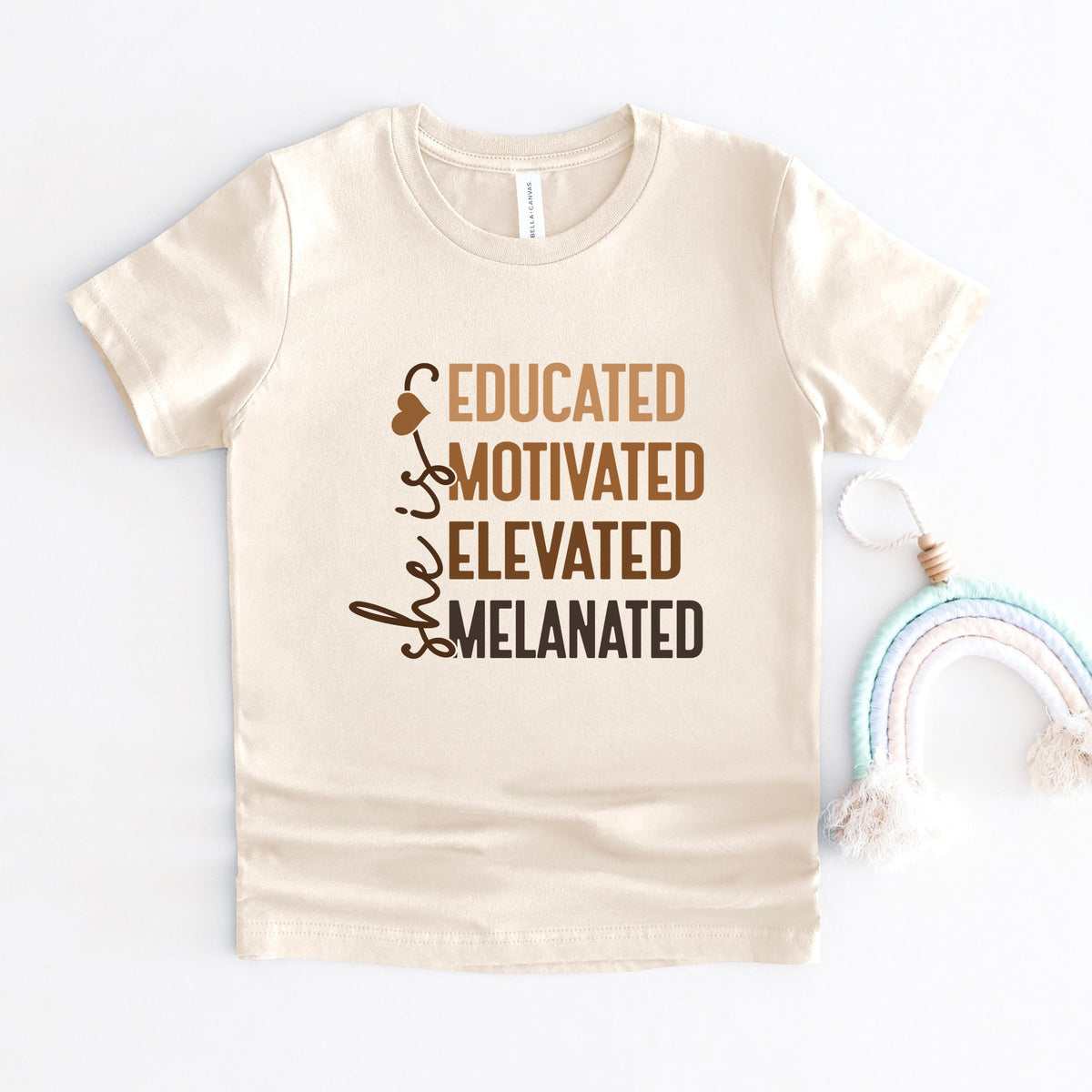 She Is Melanated - Toddler Short Sleeve Graphic T-Shirt