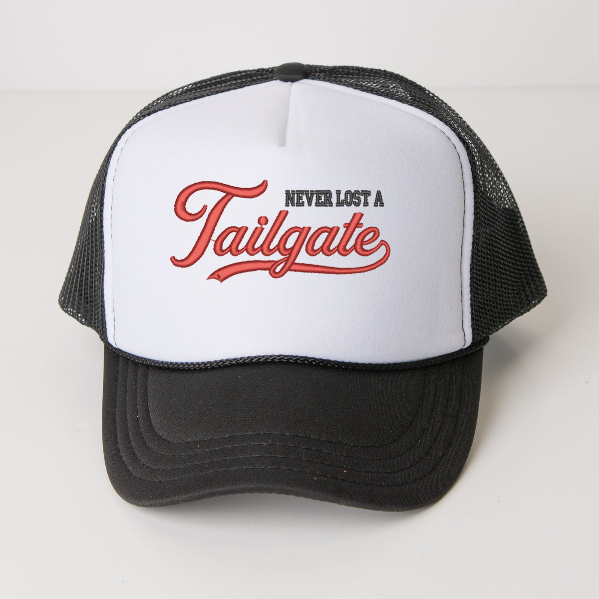 Embroidered Never Lost A Tailgate - Youth Graphic Foam Trucker Hat