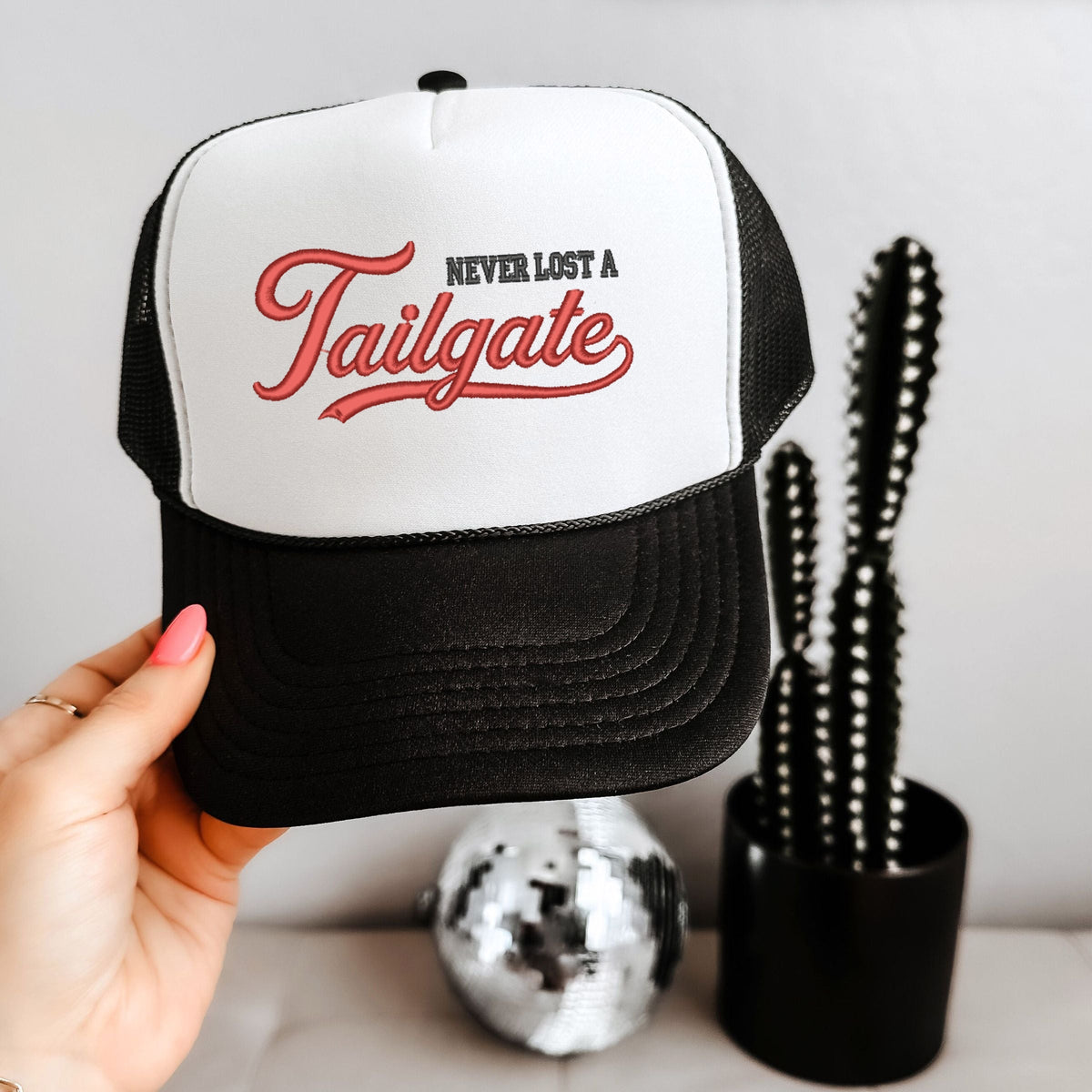 Embroidered Never Lost A Tailgate - Youth Graphic Foam Trucker Hat